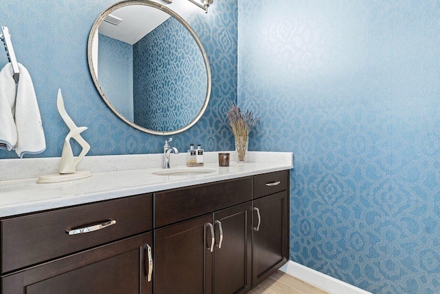 9657 Sterling Shores St, Delray Beach, FL 33446 - bathroom with vanity and wallpapered walls