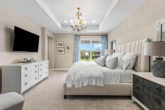 9657 Sterling Shores St, Delray Beach, FL 33446 - bedroom with access to exterior, light colored carpet, a chandelier, a raised ceiling, and baseboards