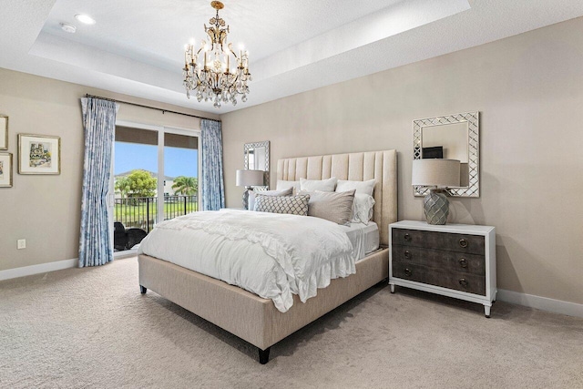 9657 Sterling Shores St, Delray Beach, FL 33446 - bedroom with a chandelier, access to exterior, baseboards, and light carpet