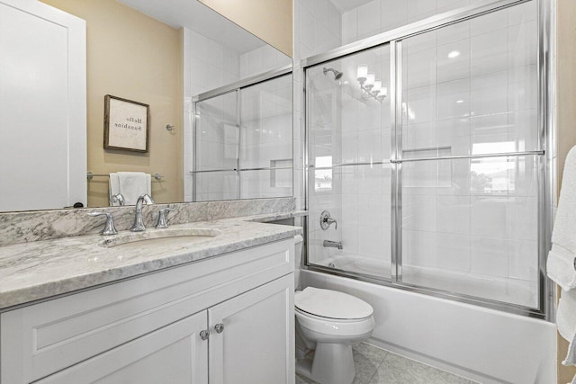 9657 Sterling Shores St, Delray Beach, FL 33446 - full bathroom with toilet, vanity, bath / shower combo with glass door, and tile patterned floors