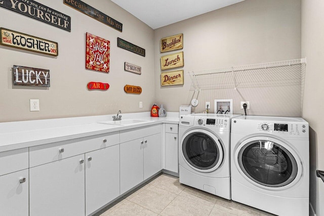 9657 Sterling Shores St, Delray Beach, FL 33446 - washroom featuring separate washer and dryer, cabinet space, and light tile patterned flooring