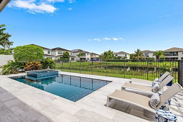9657 Sterling Shores St, Delray Beach, FL 33446 - view of swimming pool featuring a residential view, a pool with connected hot tub, and a patio area