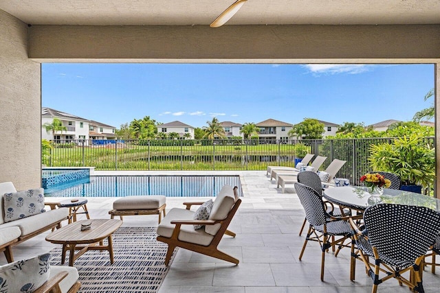 9657 Sterling Shores St, Delray Beach, FL 33446 - view of pool featuring a patio, a fenced backyard, a residential view, outdoor dining area, and a pool with connected hot tub