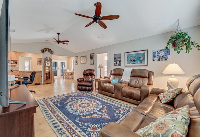 12275 N 54th St N, West Palm Beach, FL 33411 - living room featuring ceiling fan, lofted ceiling, and light wood-style floors