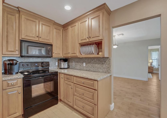 12275 N 54th St N, West Palm Beach, FL 33411 - kitchen featuring black appliances, tasteful backsplash, and light brown cabinetry