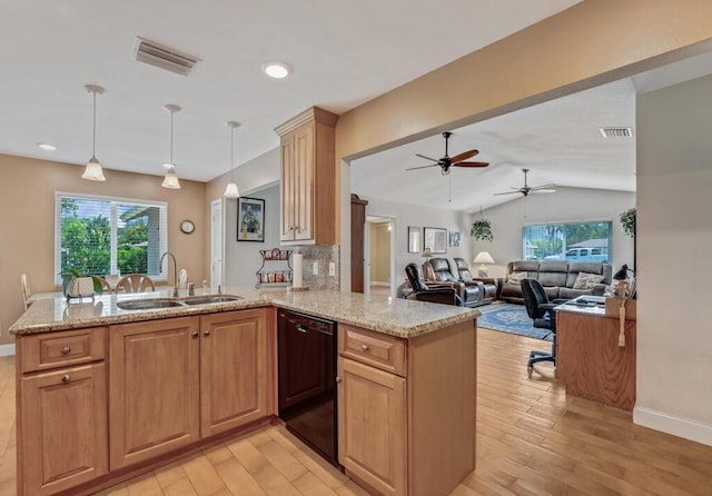 12275 N 54th St N, West Palm Beach, FL 33411 - kitchen featuring dishwasher, a sink, light wood finished floors, light stone countertops, and vaulted ceiling