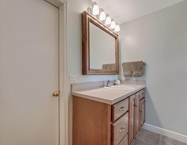 12275 N 54th St N, West Palm Beach, FL 33411 - bathroom with vanity, tile patterned floors, and baseboards