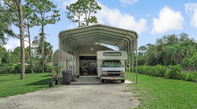 12275 N 54th St N, West Palm Beach, FL 33411 - view of vehicle parking featuring a carport and gravel driveway