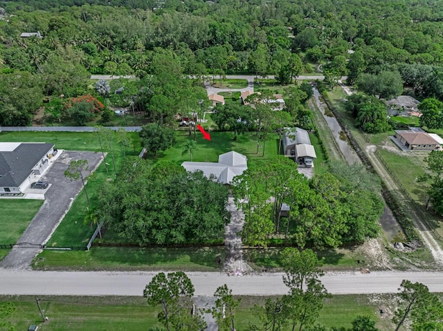 12275 N 54th St N, West Palm Beach, FL 33411 - view of property location featuring a heavily wooded area