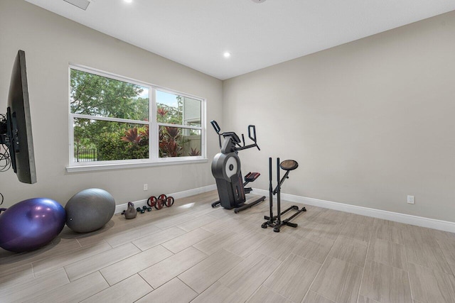 9258 Greenspire Ln, Lake Worth, FL 33467 - workout area with baseboards, wood finish floors, and recessed lighting