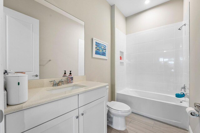 9258 Greenspire Ln, Lake Worth, FL 33467 - full bath with toilet, vanity, and shower / bathtub combination