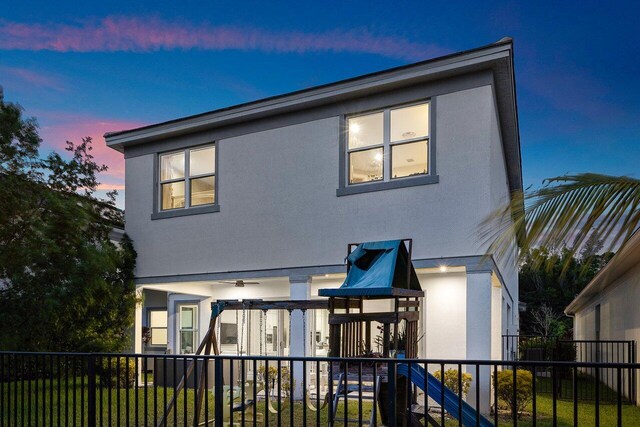 9258 Greenspire Ln, Lake Worth, FL 33467 - back of property featuring stucco siding