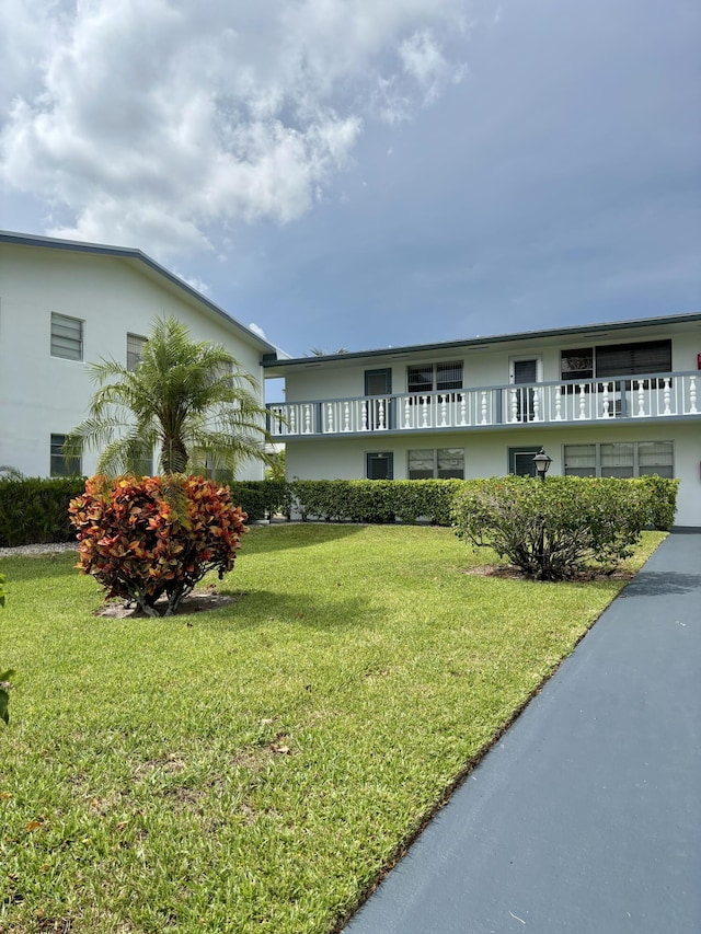76 Cambridge Unit D, West Palm Beach, FL 33417 - view of building exterior