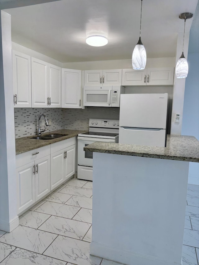 76 Cambridge Unit D, West Palm Beach, FL 33417 - kitchen with white appliances, light marble finish floors, a sink, and white cabinetry
