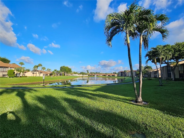 806 Sky Pine Way Unit G3, Greenacres, FL 33415 - view of grassy yard featuring a water view and a residential view