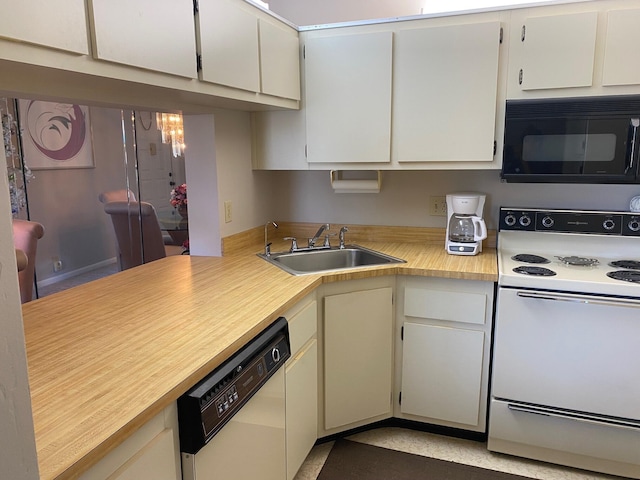 806 Sky Pine Way Unit G3, Greenacres, FL 33415 - kitchen with white appliances, a sink, and light countertops
