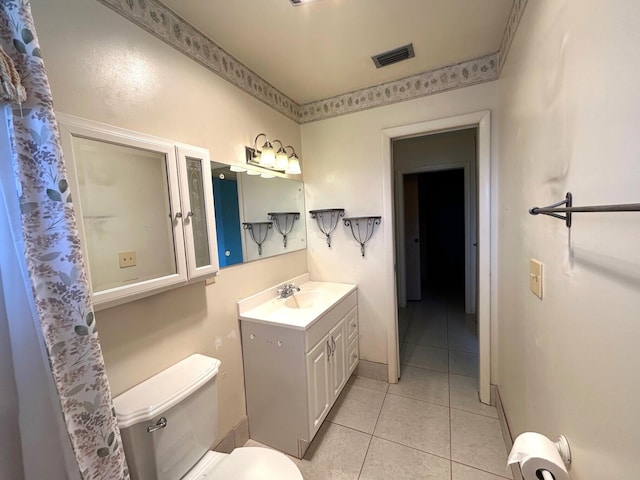 2802 Crosley Dr W Unit D, West Palm Beach, FL 33415 - bathroom with tile patterned floors, vanity, and toilet