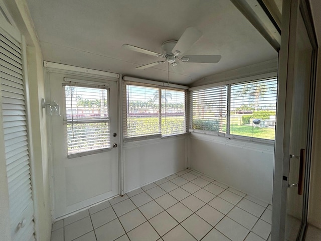 2802 Crosley Dr W Unit D, West Palm Beach, FL 33415 - unfurnished sunroom featuring ceiling fan, tile patterned floors, and vaulted ceiling