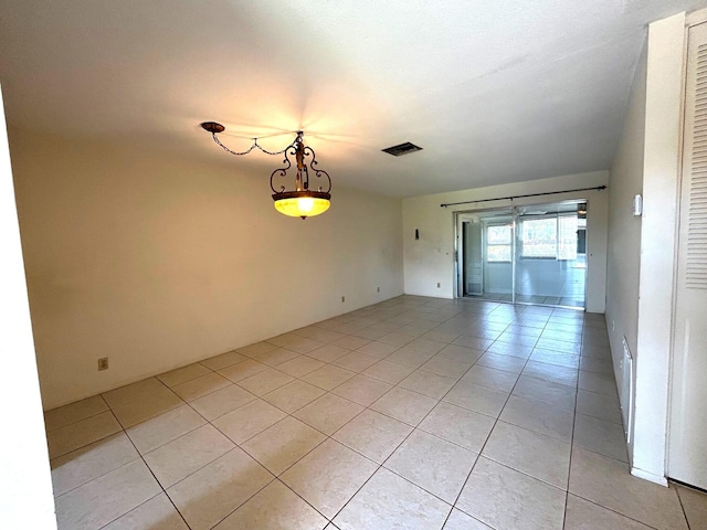 2802 Crosley Dr W Unit D, West Palm Beach, FL 33415 - empty room with light tile patterned floors