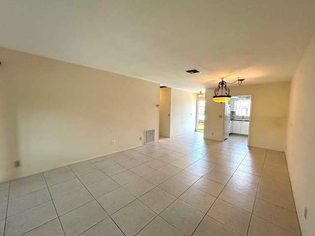 2802 Crosley Dr W Unit D, West Palm Beach, FL 33415 - empty room with light tile patterned floors