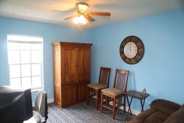 864 SE Tierra Ct, Port Saint Lucie, FL 34983 - home office featuring a ceiling fan, baseboards, and a textured ceiling
