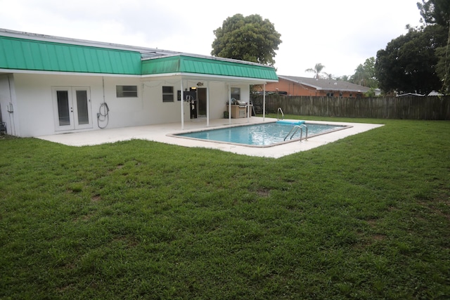 864 SE Tierra Ct, Port Saint Lucie, FL 34983 - view of pool featuring french doors and a patio