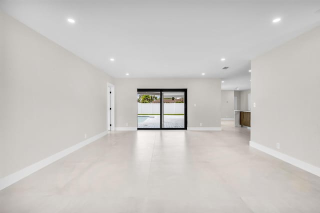 1182 SW 7th St, Boca Raton, FL 33486 - unfurnished room with finished concrete flooring, baseboards, and recessed lighting