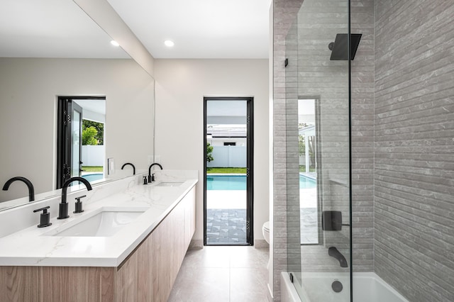 1182 SW 7th St, Boca Raton, FL 33486 - full bath with toilet, double vanity, washtub / shower combination, tile patterned flooring, and recessed lighting