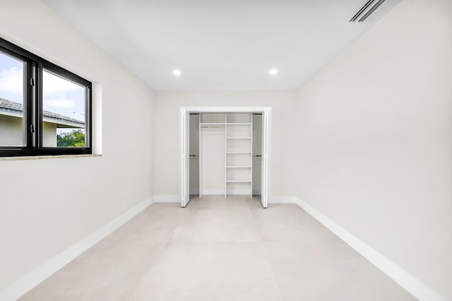 1182 SW 7th St, Boca Raton, FL 33486 - unfurnished bedroom featuring baseboards, recessed lighting, and a closet