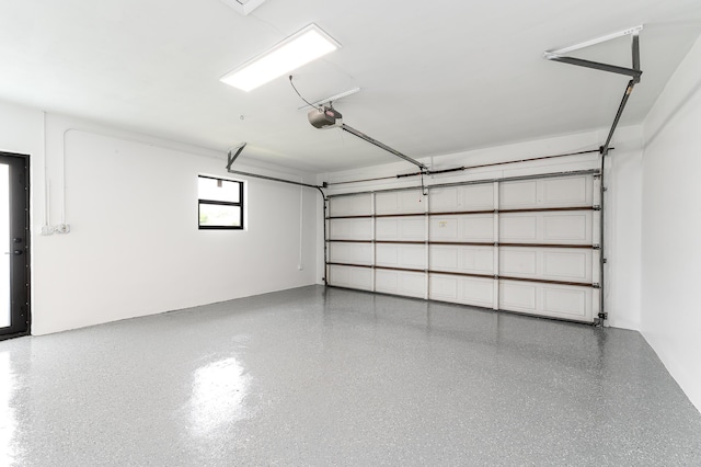 1182 SW 7th St, Boca Raton, FL 33486 - garage featuring a garage door opener