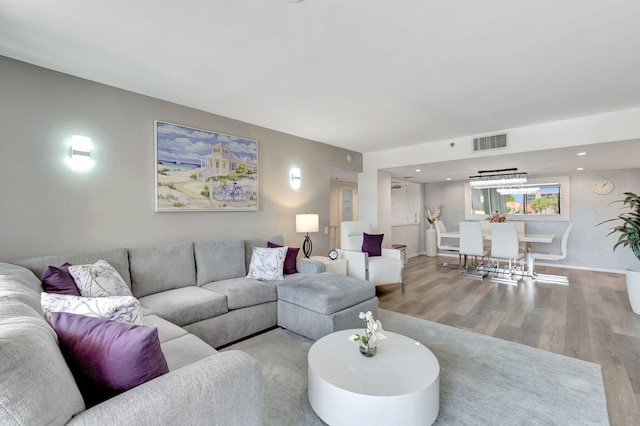2701 N Ocean Blvd Unit E205, Boca Raton, FL 33431 - living room featuring wood finished floors