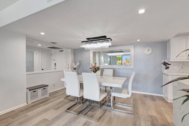 2701 N Ocean Blvd Unit E205, Boca Raton, FL 33431 - dining room with light wood finished floors, baseboards, and recessed lighting
