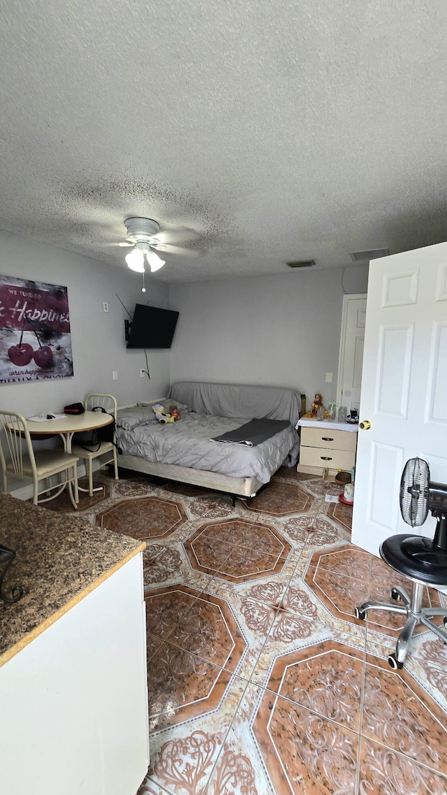 5692 Coconut Rd, West Palm Beach, FL 33413 - living area featuring ceiling fan and a textured ceiling