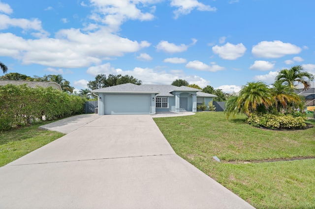 924 SW Abingdon Ave, Port Saint Lucie, FL 34953 - ranch-style home featuring an attached garage, driveway, and stucco siding