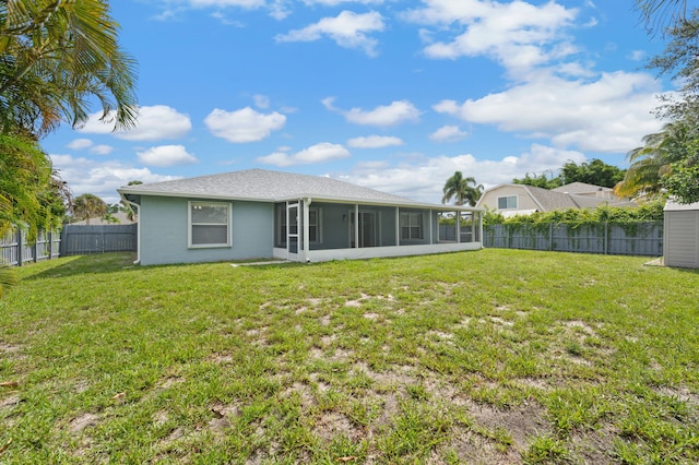 924 SW Abingdon Ave, Port Saint Lucie, FL 34953 - back of house with a sunroom