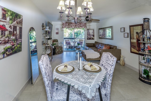 2755 W Atlantic Ave Unit 2208, Delray Beach, FL 33445 - tiled dining space featuring a chandelier and baseboards