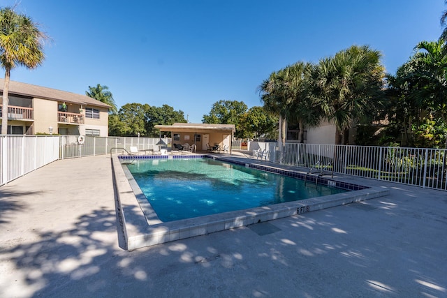 2755 W Atlantic Ave Unit 2208, Delray Beach, FL 33445 - community pool featuring a patio