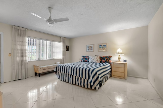 1250 Club Dr W Unit C, Delray Beach, FL 33445 - bedroom featuring baseboards, a textured ceiling, light tile patterned flooring, and ceiling fan