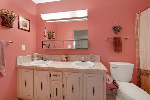 1250 Club Dr W Unit C, Delray Beach, FL 33445 - bathroom featuring double vanity, toilet, and curtained shower
