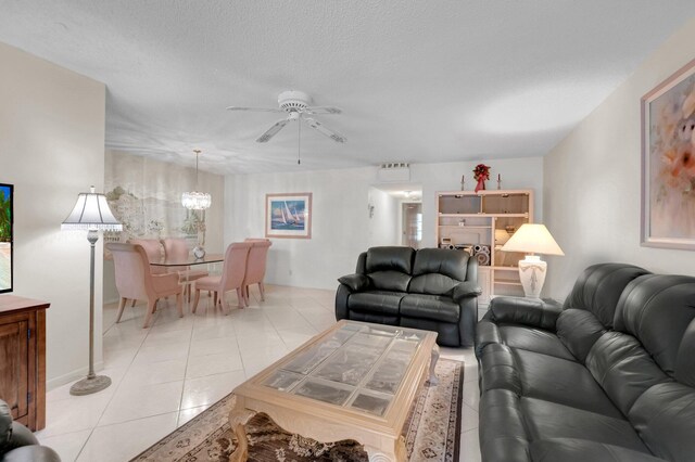 1250 Club Dr W Unit C, Delray Beach, FL 33445 - living area with ceiling fan, a chandelier, and light tile patterned floors