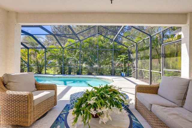 4312 SW Elaine Ct, Port Saint Lucie, FL 34953 - swimming pool with an outdoor living space, a patio area, and glass enclosure