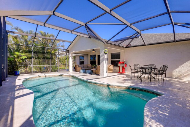 4312 SW Elaine Ct, Port Saint Lucie, FL 34953 - outdoor pool featuring an outdoor living space, a patio, a ceiling fan, and a lanai
