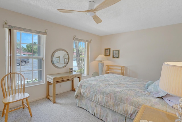 724 Nantucket Cir Unit A, Lake Worth, FL 33467 - carpeted bedroom with a textured ceiling and ceiling fan