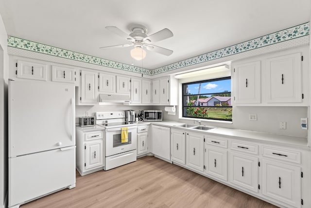 4858 Equestrian Rd Unit B, Boynton Beach, FL 33436 - kitchen featuring white appliances, a sink, and white cabinets