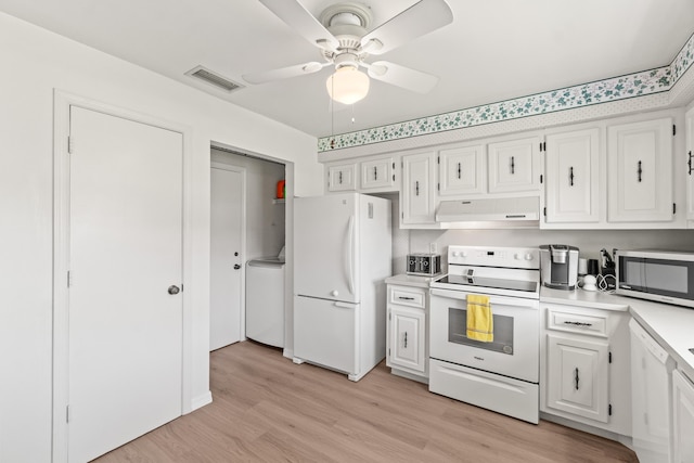 4858 Equestrian Rd Unit B, Boynton Beach, FL 33436 - kitchen with white appliances, under cabinet range hood, light countertops, light wood-style floors, and ceiling fan