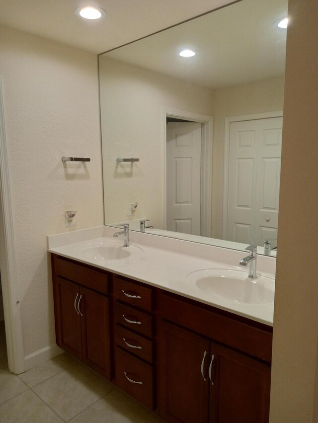 2 Antigua Ln, Port Saint Lucie, FL 34952 - full bath featuring double vanity, tile patterned flooring, and recessed lighting