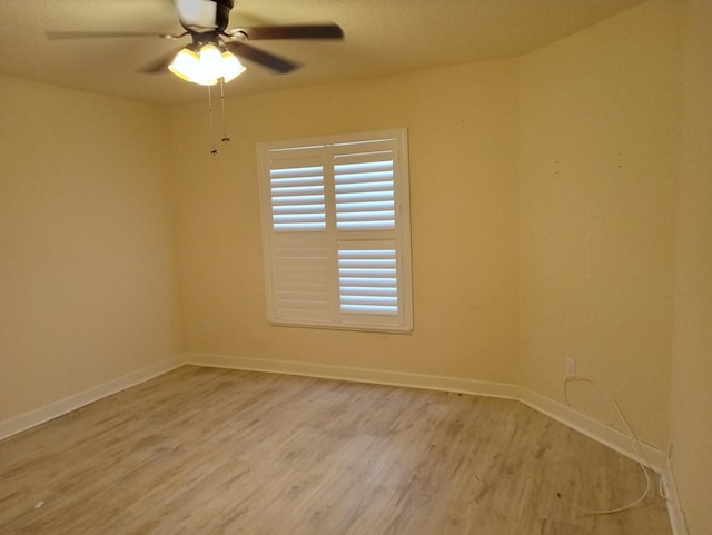 2 Antigua Ln, Port Saint Lucie, FL 34952 - unfurnished room with light wood finished floors, ceiling fan, and baseboards