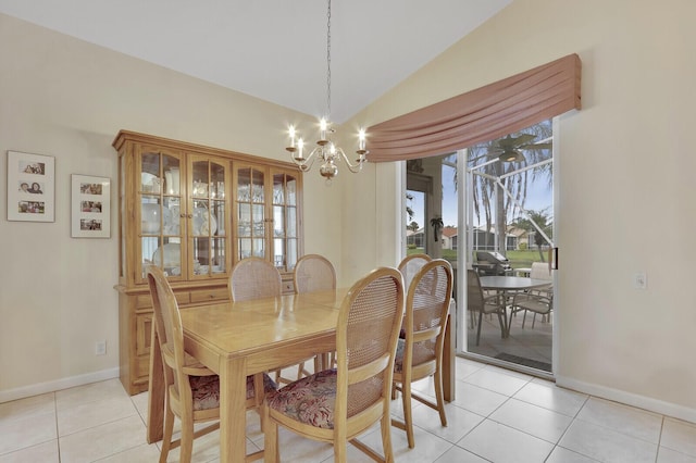 257 NW Toscane Trl, Port Saint Lucie, FL 34986 - dining area featuring baseboards, lofted ceiling, light tile patterned floors, healthy amount of natural light, and a chandelier