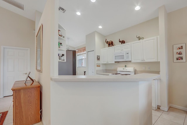 257 NW Toscane Trl, Port Saint Lucie, FL 34986 - kitchen with white appliances, light tile patterned floors, light countertops, white cabinets, and open shelves