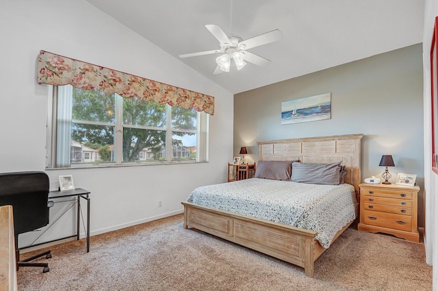 257 NW Toscane Trl, Port Saint Lucie, FL 34986 - bedroom with carpet, vaulted ceiling, an office area, baseboards, and a ceiling fan